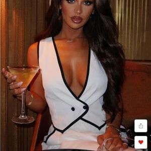 Elegant White Sleeveless Vest Top with Black Trim